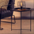 Black Powder Coated Metal Round Side Table with Intersecting Cross Base, Acero - Joe’s Haven