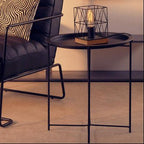 Black Powder Coated Metal Round Side Table with Intersecting Cross Base, Acero - Joe’s Haven