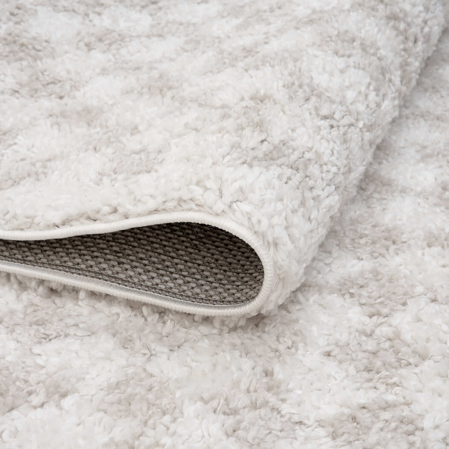 Moodi Shaggy Light Beige Nomari Rug - Joe’s Haven