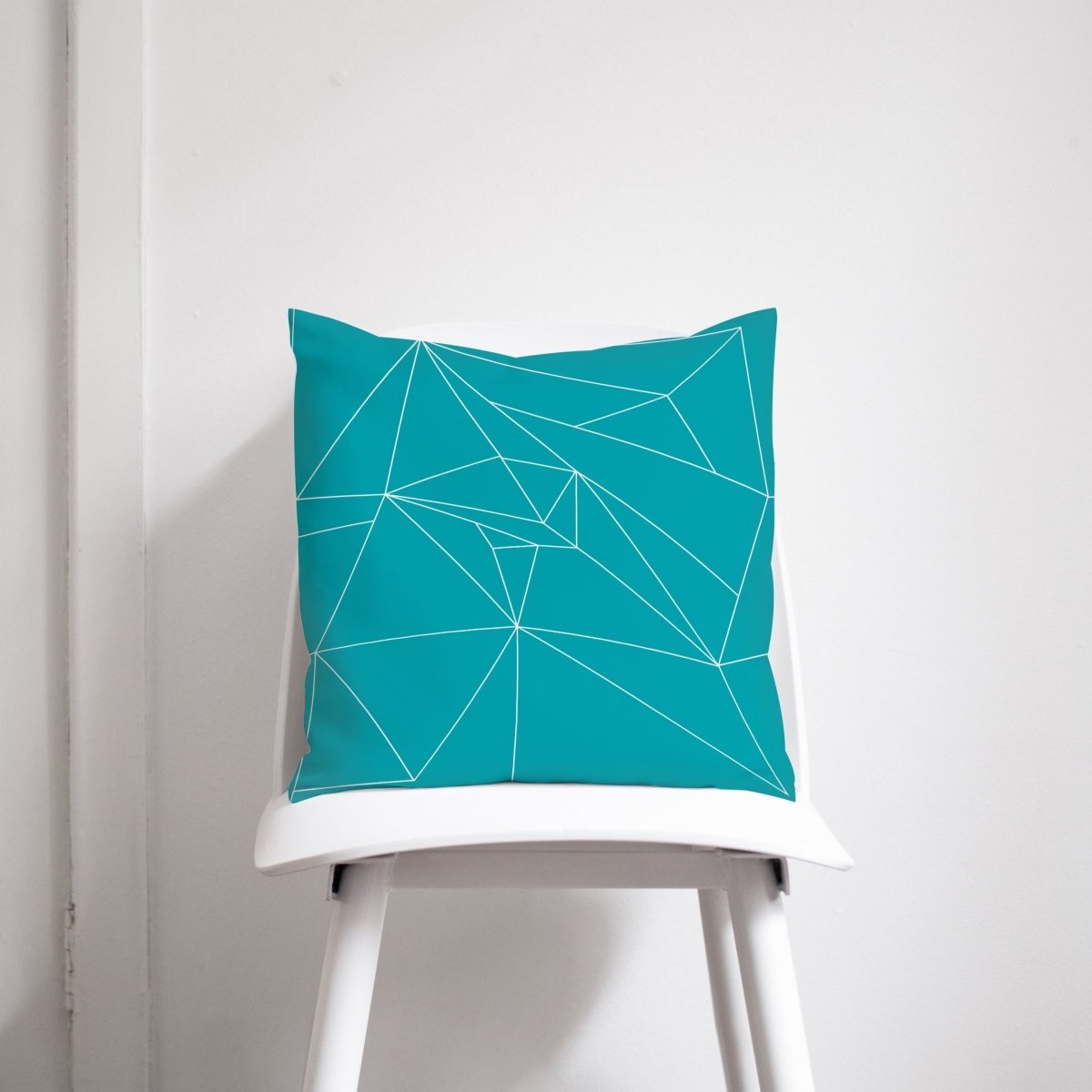 Turquoise Cushion with a White Geometric Design, Throw Pillow - Joe’s Haven