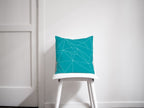Turquoise Cushion with a White Geometric Design, Throw Pillow - Joe’s Haven