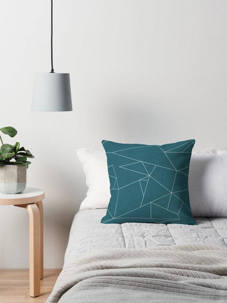 Teal Cushion with a White Geometric Line Design, Throw Pillow - Joe’s Haven
